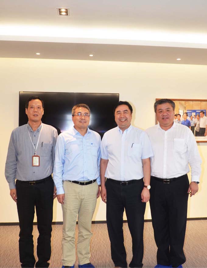 1474608842666746.jpg 赵振元同志、何平书记与上海宝冶集团董事长王石磊、总经理陈刚亲切合影.jpg